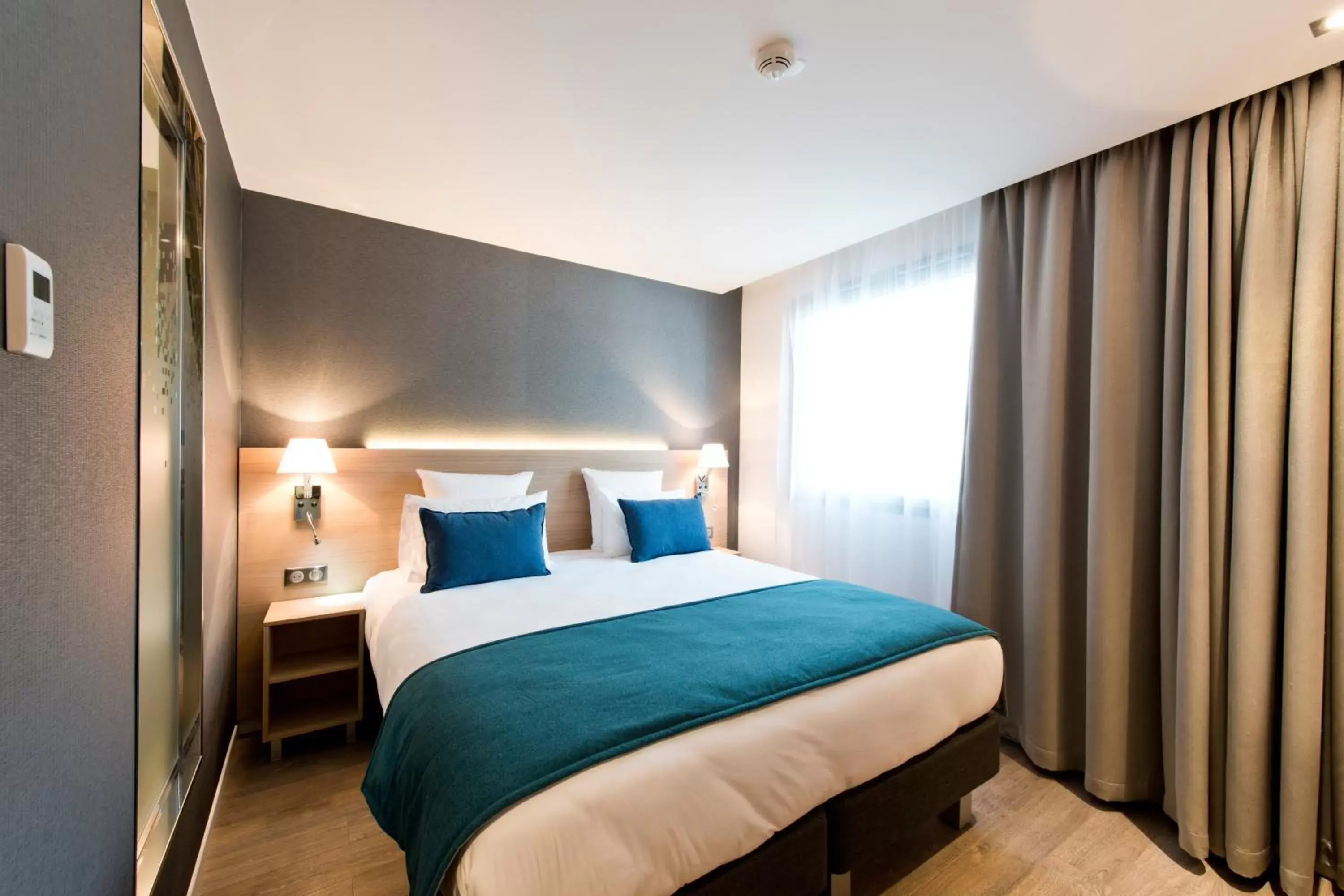 Bed in Golden Tulip Sophia Antipolis - Hotel & Spa Bed in Golden Tulip Sophia Antipolis - Hotel & Spa