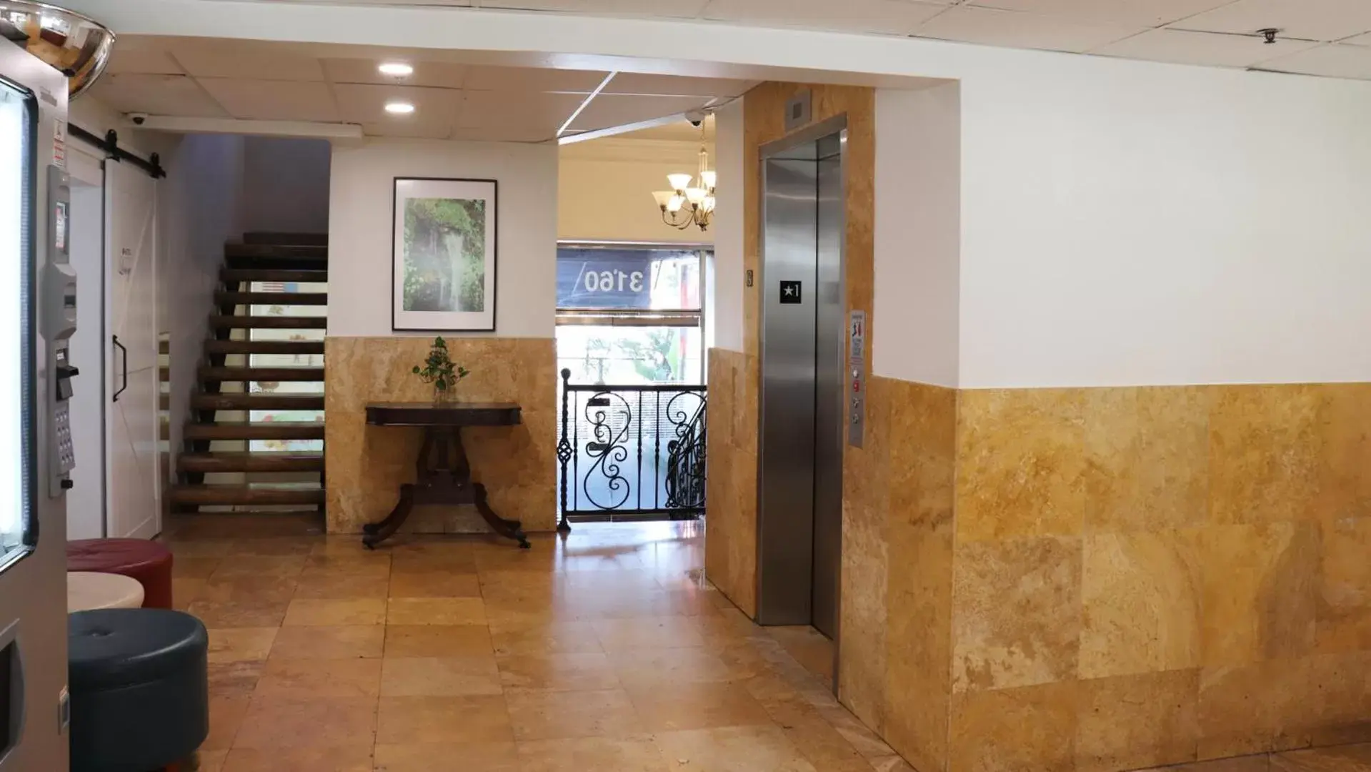 Lobby or reception in Hometel Suites Lobby or reception in Hometel Suites