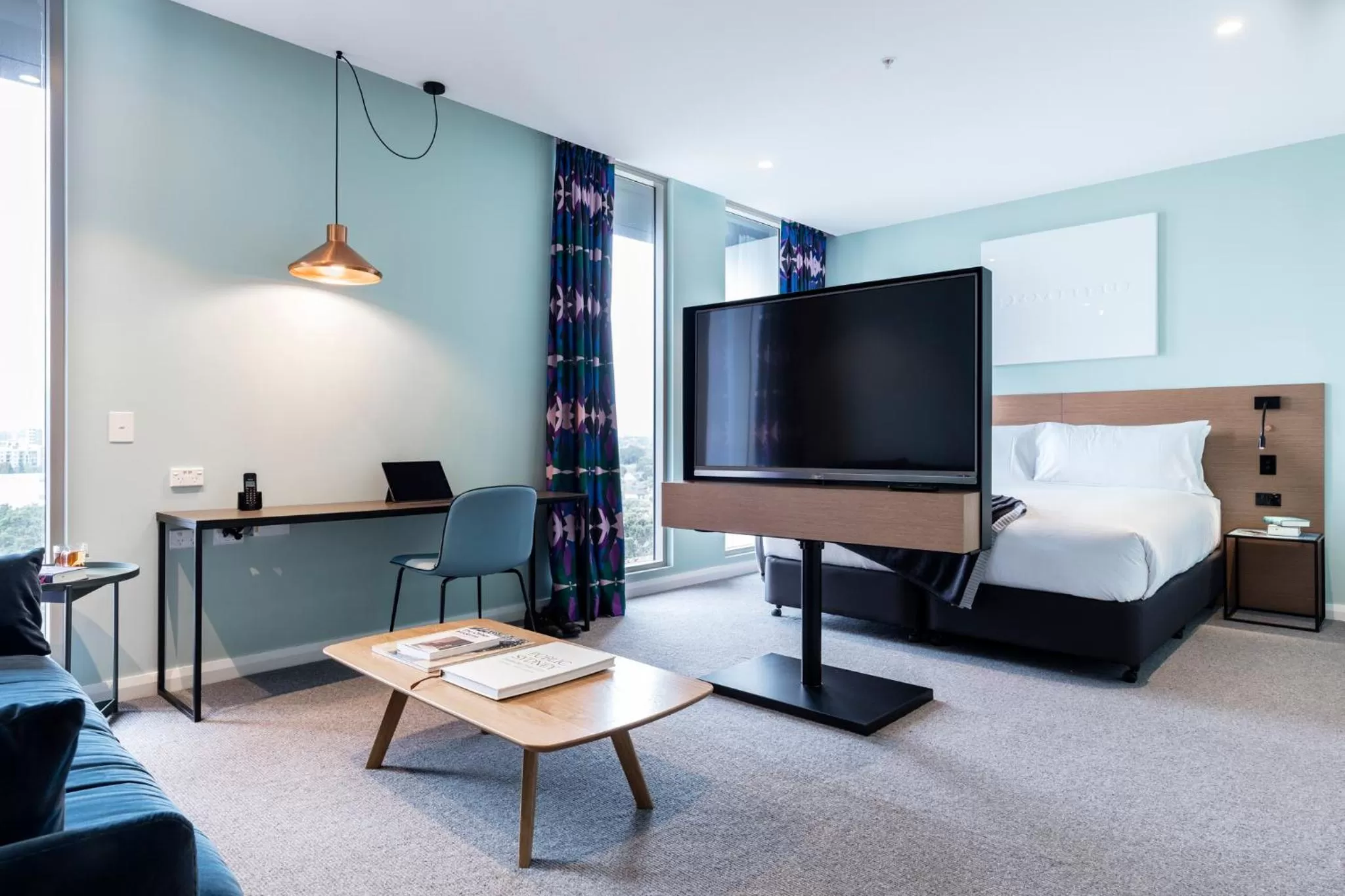 Living room, Bed in Citadines Connect Sydney Airport