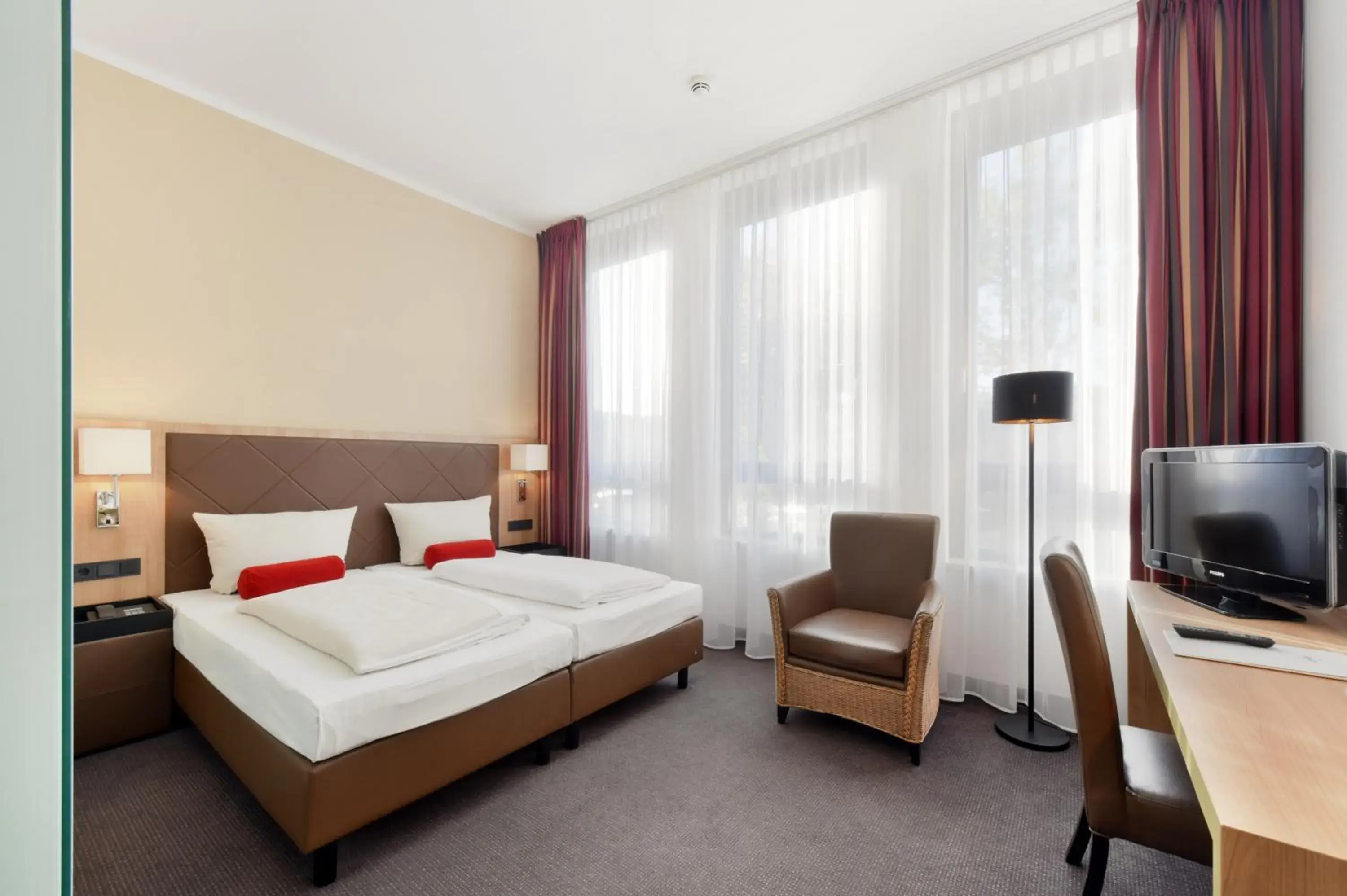 Photo of the whole room, Bed in ACHAT Hotel München Süd Photo of the whole room, Bed in ACHAT Hotel München Süd