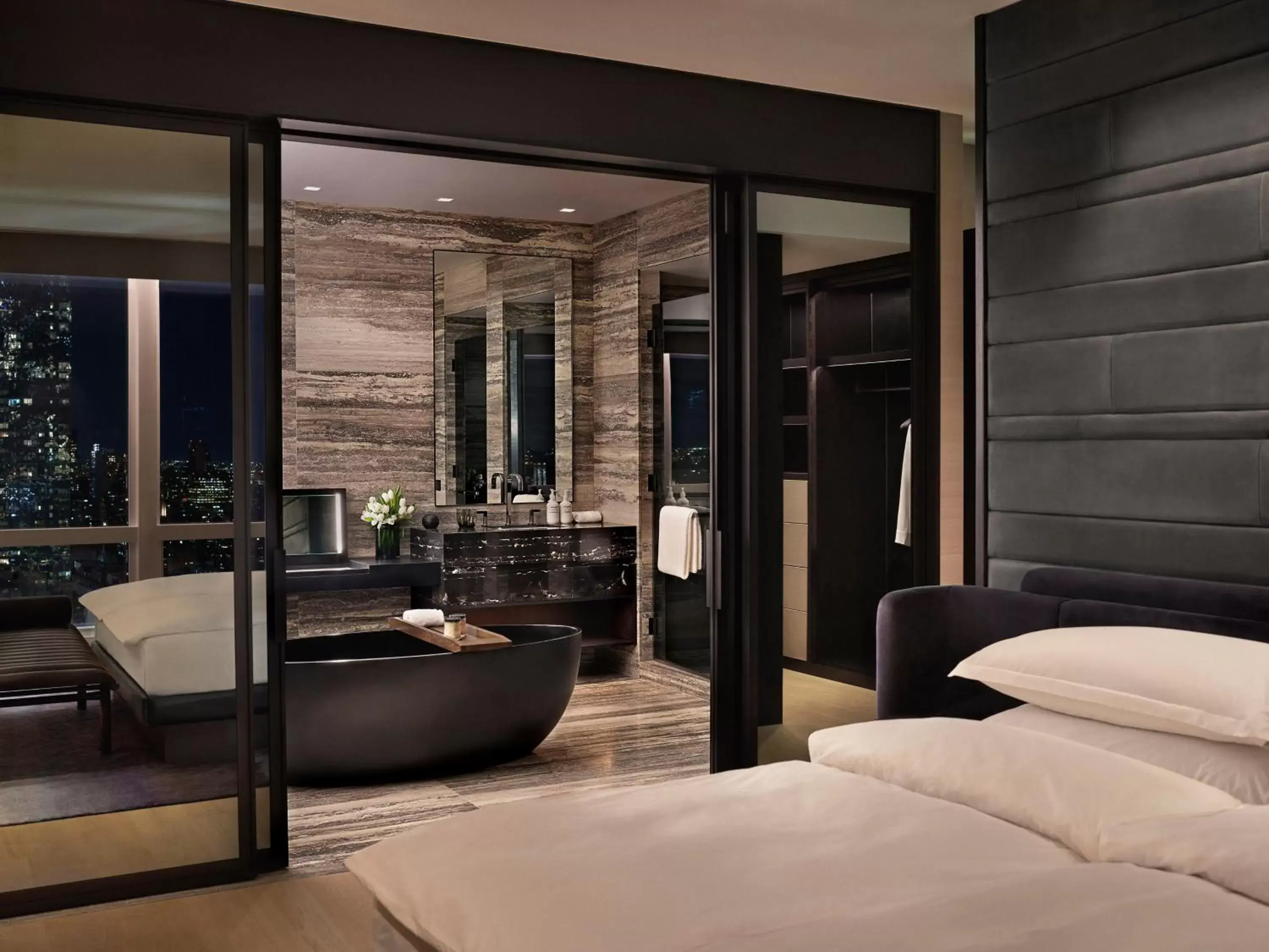 Bathroom, Bed in Equinox Hotel New York Bathroom, Bed in Equinox Hotel New York