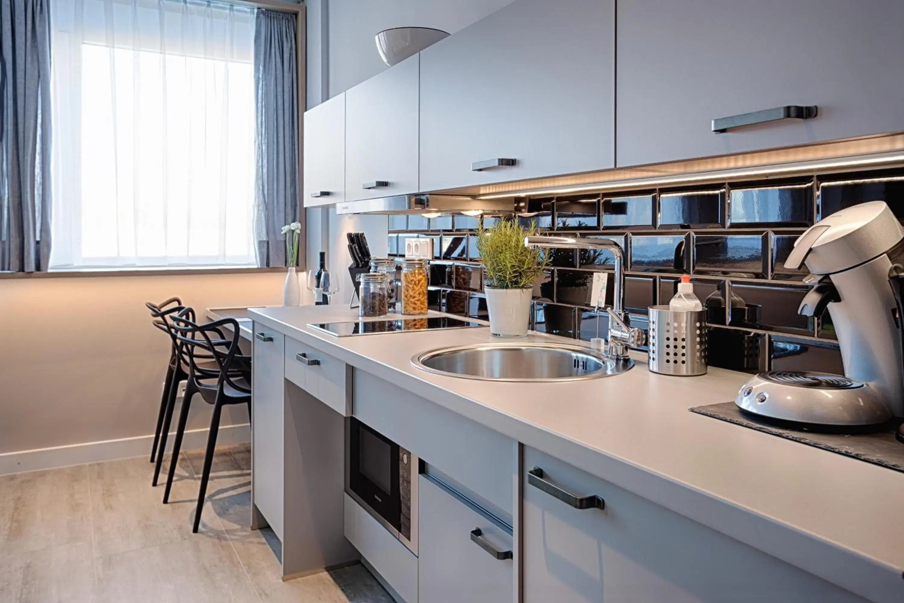 Kitchen or kitchenette in MLOFT Apartments München Kitchen or kitchenette in MLOFT Apartments München