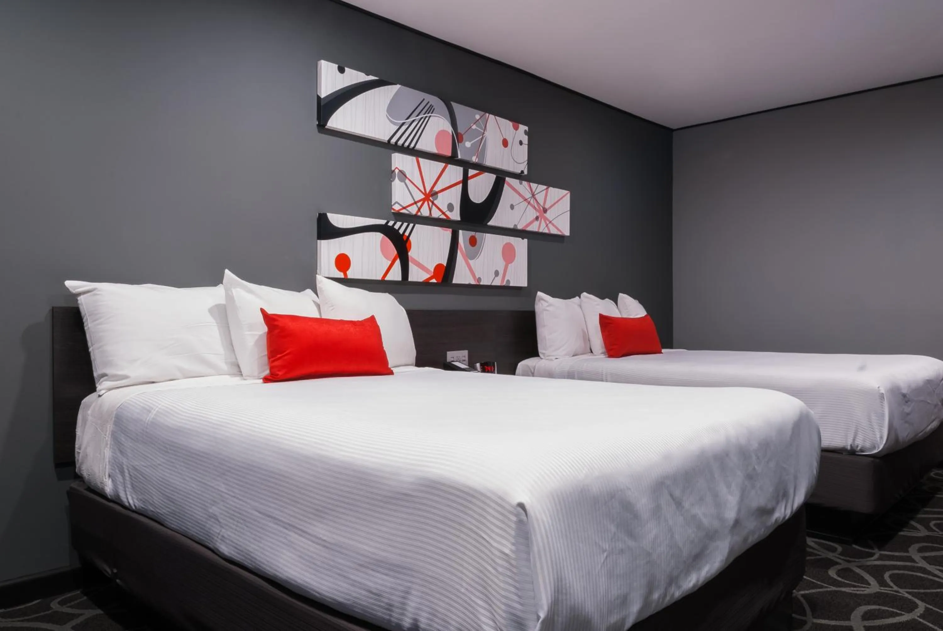 Bed in Astro Pasadena Hotel