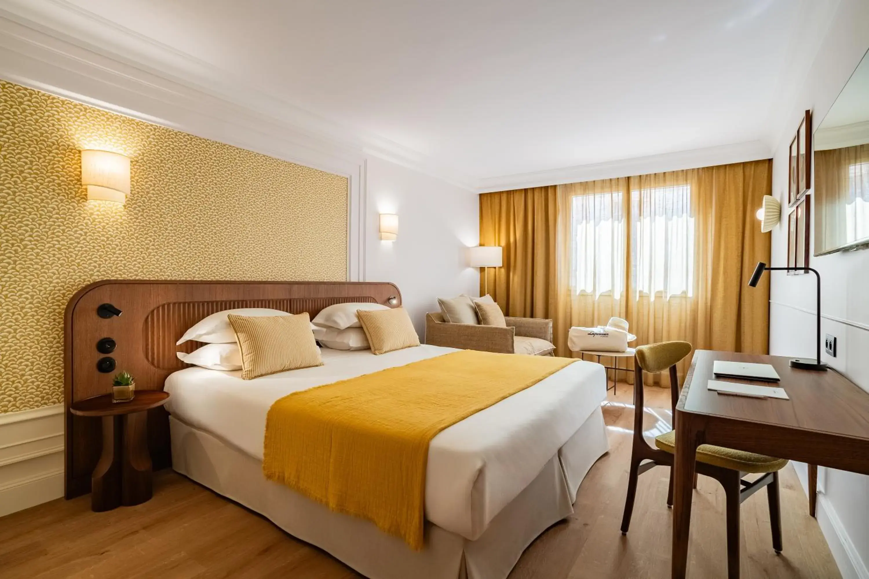 Bed in Hôtel Lepoussin Bed in Hôtel Lepoussin