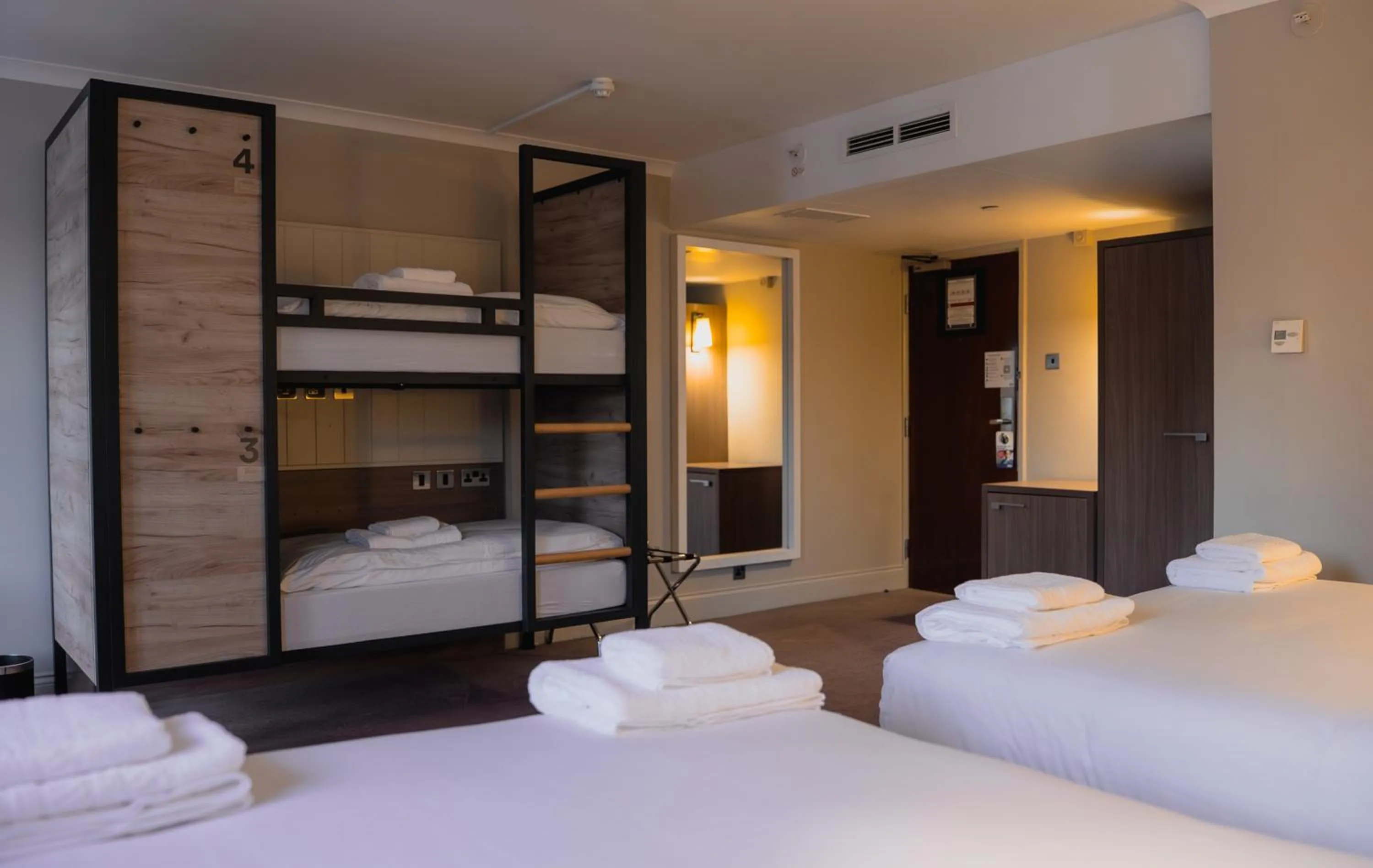Photo of the whole room, Bed in a&o London Docklands Riverside