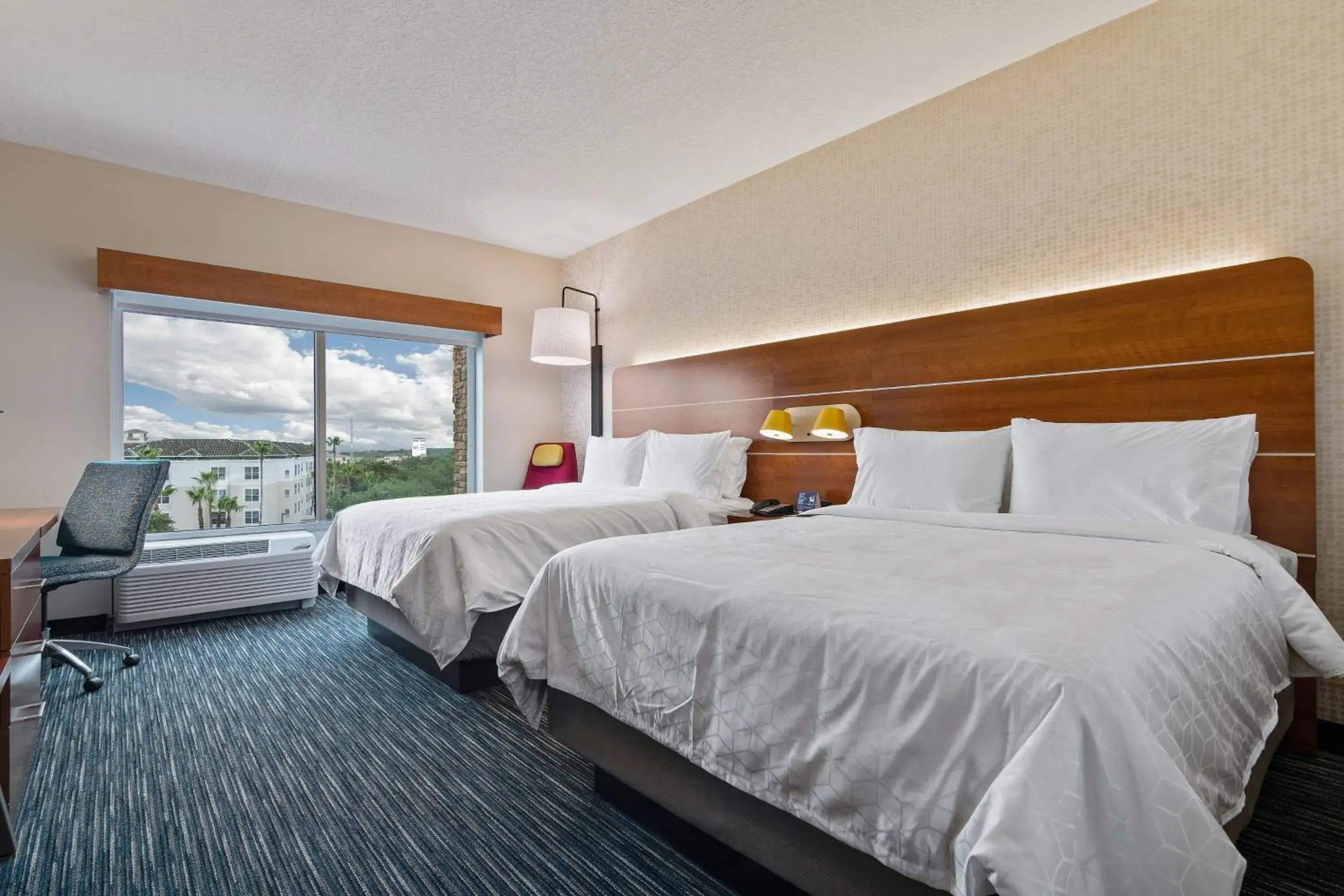 Photo of the whole room, Bed in Holiday Inn Express & Suites Orlando- Lake Buena Vista by IHG Photo of the whole room, Bed in Holiday Inn Express & Suites Orlando- Lake Buena Vista by IHG