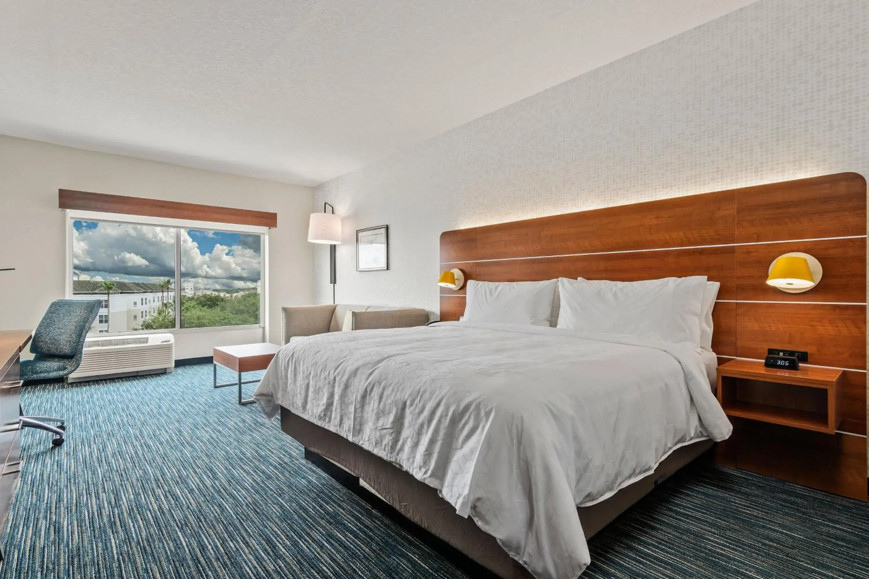 Photo of the whole room, Bed in Holiday Inn Express & Suites Orlando- Lake Buena Vista by IHG Photo of the whole room, Bed in Holiday Inn Express & Suites Orlando- Lake Buena Vista by IHG