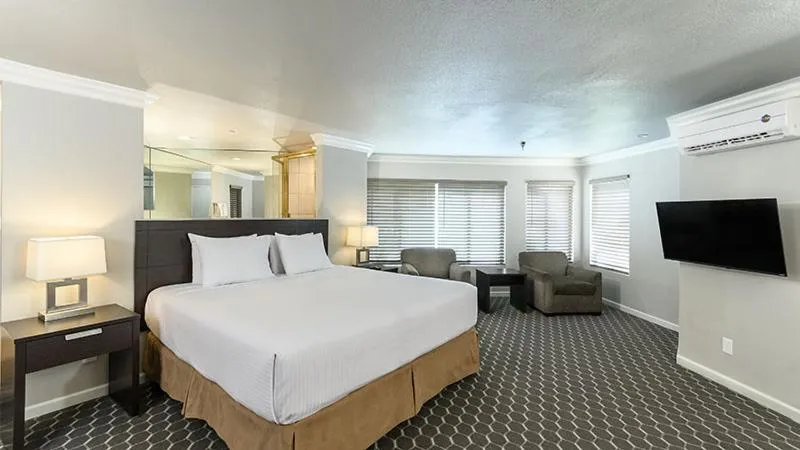 Bed in Alexis Park All Suite Resort