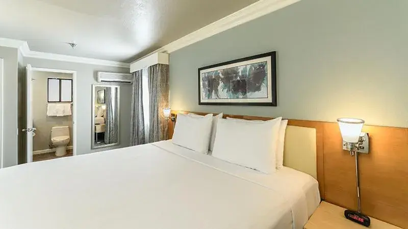 Bed in Alexis Park All Suite Resort Bed in Alexis Park All Suite Resort