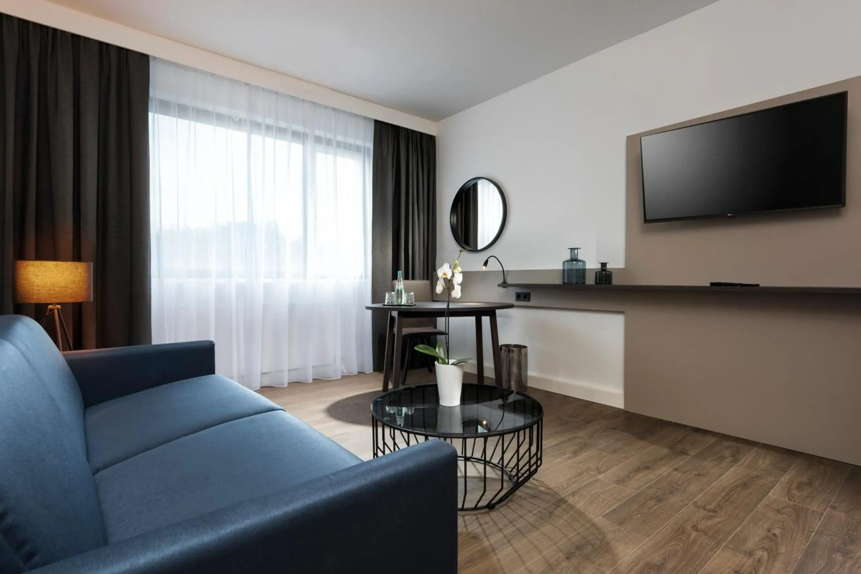 Living room in Holiday Inn Berlin City-West by IHG Living room in Holiday Inn Berlin City-West by IHG