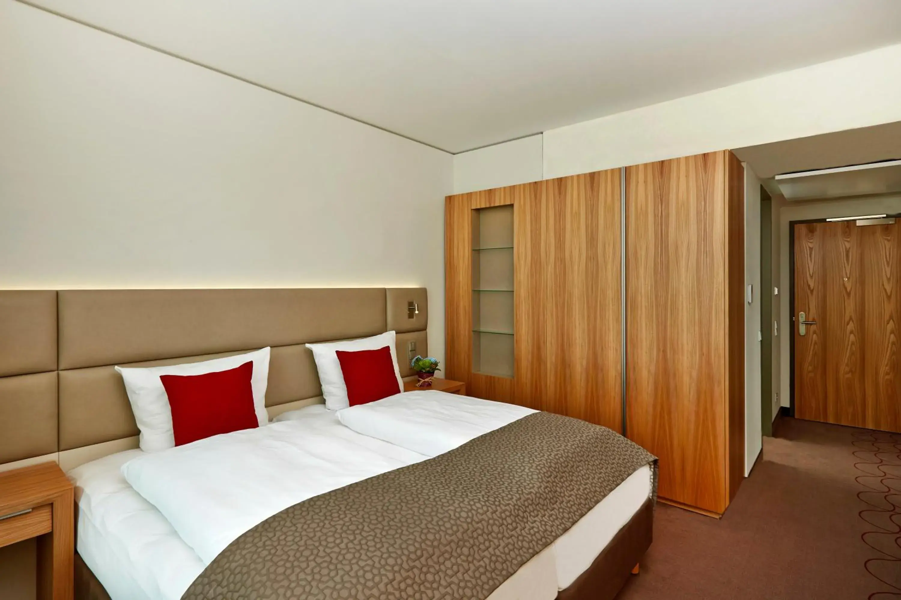 Photo of the whole room, Bed in H4 Hotel München Messe Photo of the whole room, Bed in H4 Hotel München Messe
